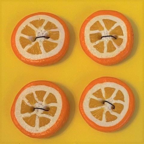 Handgjorda knappar apelsinskiva