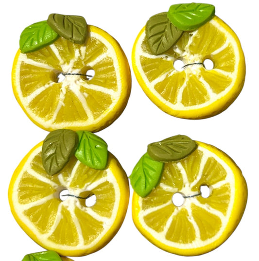 Handgjorda knappar citron med blad