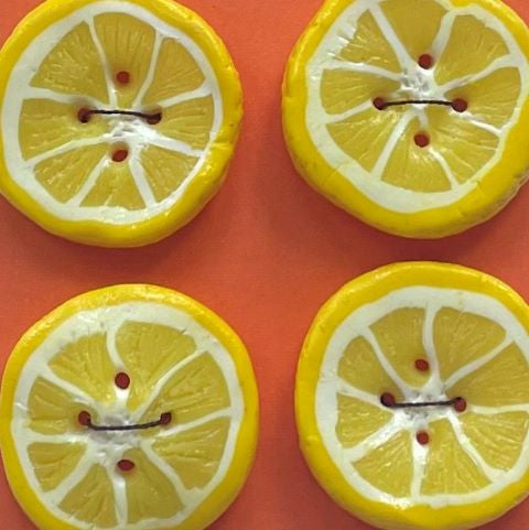 Handgjorda knappar citronskiva med 4 hål.